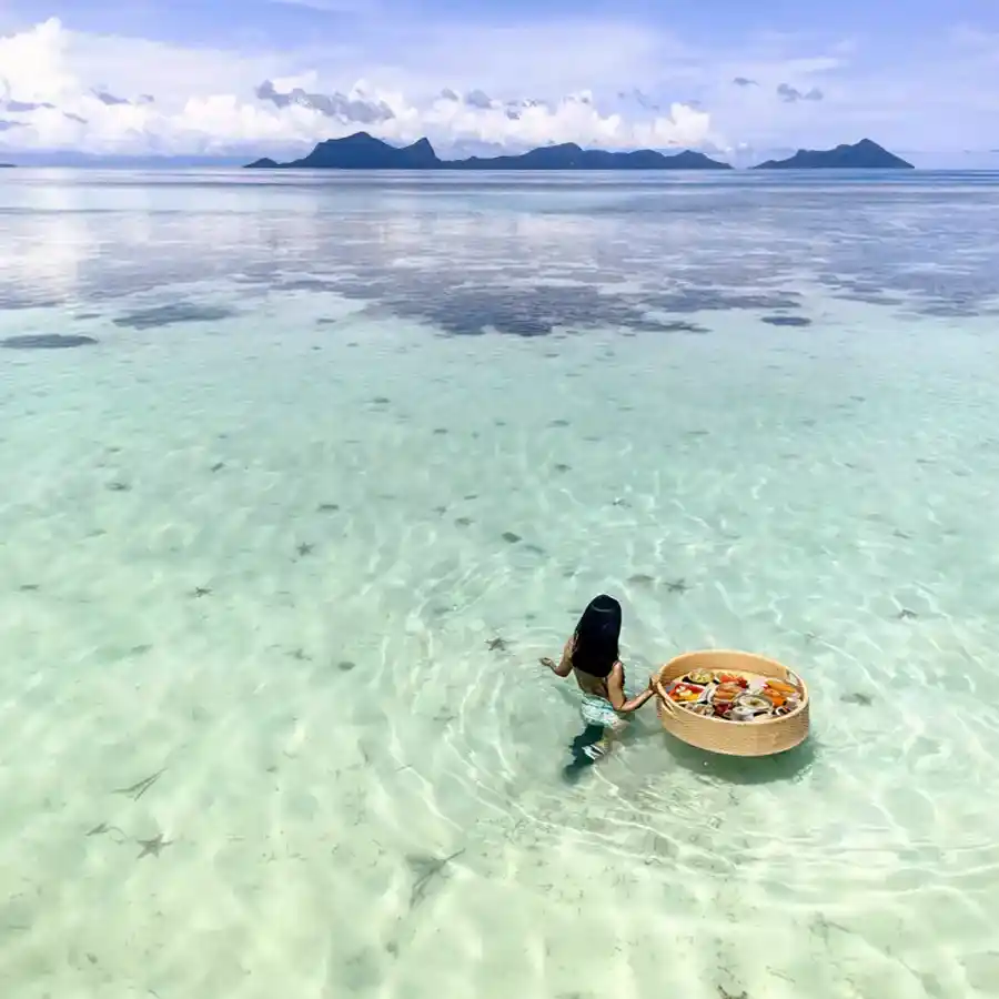 Snorkelling in clear waters of the Celebes Sea