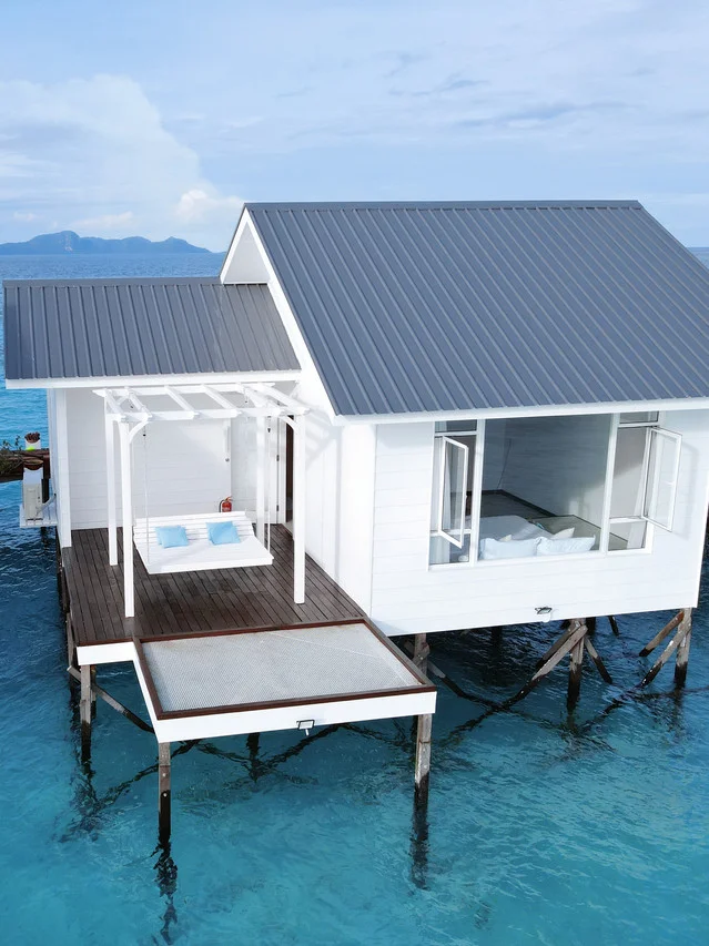 Aerial view of luxury villa deck with hammock, Bubblefish Water Villa